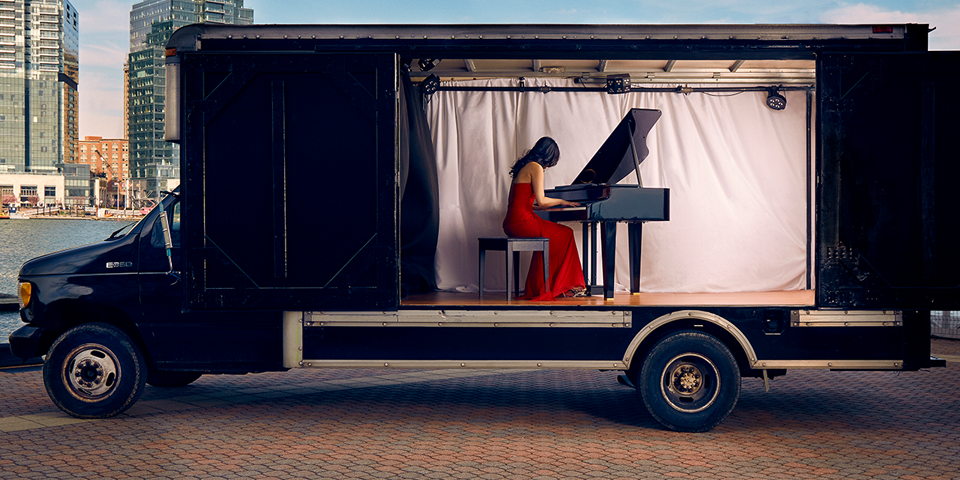 Susan Zhang playing on the concert truck